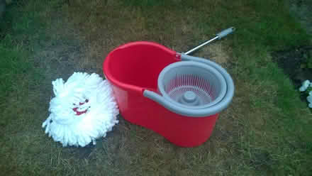 Photo of free Mop and red water bucket (High Brooms) #2