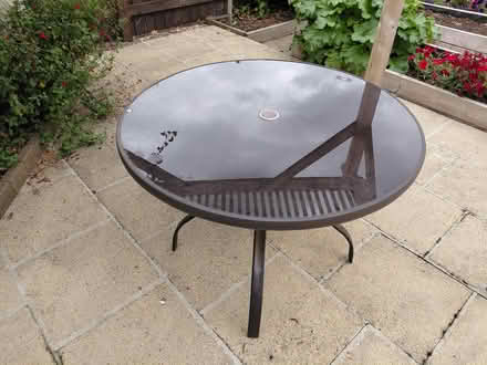 Photo of free Round glass topped patio table (Bradford on Avon BA15) #1