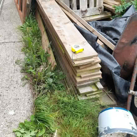 Photo of free 9 by 1 inch treated planks (Knighton LD7) #1