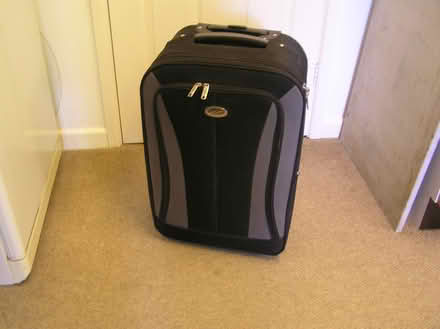 Photo of free Large suitcase + wheels used once (West Moors) #2