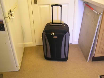 Photo of free Large suitcase + wheels used once (West Moors) #1