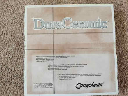 Photo of free Box of floor tiles (Off of School Bell Road) #1