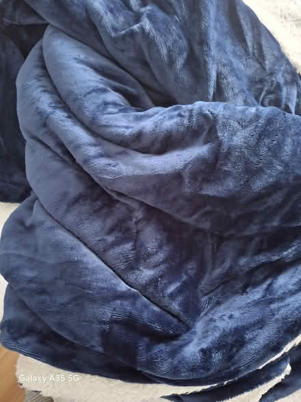 Photo of free Amazon king size throw (Swords) #1
