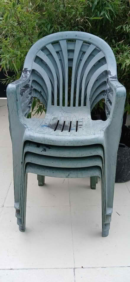 Photo of free 4 plastic outdoor armrests chairs (BS7) #1