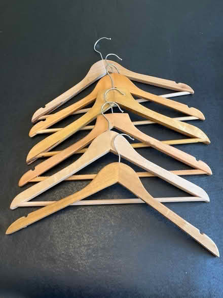 Photo of free 6 wooden coathangers (Battledown GL52) #1