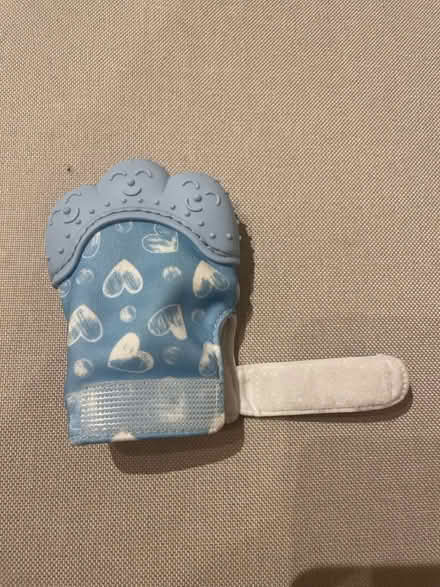 Photo of free Blue teething mitten (201 Streatham High Road) #2