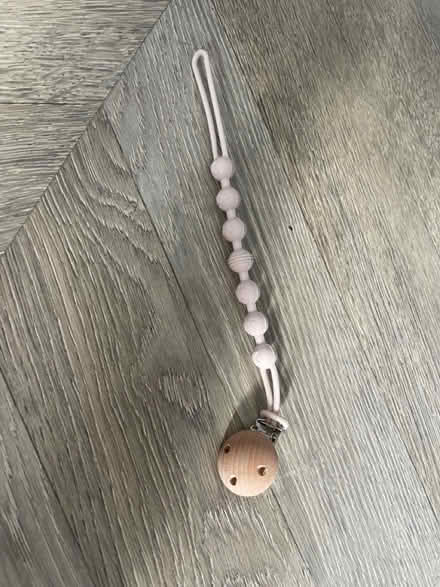Photo of free 2x rubber baby pink dummy clips (201 Streatham High Road) #1