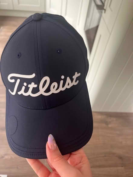 Photo of free Titleist golf cap navy and white (Wokingham RG40) #1