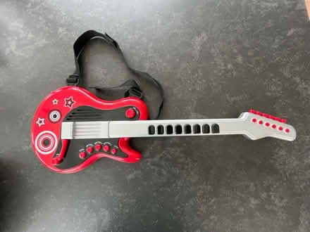 Photo of free Child’s battery operated guitar (Cheltenham GL51) #1