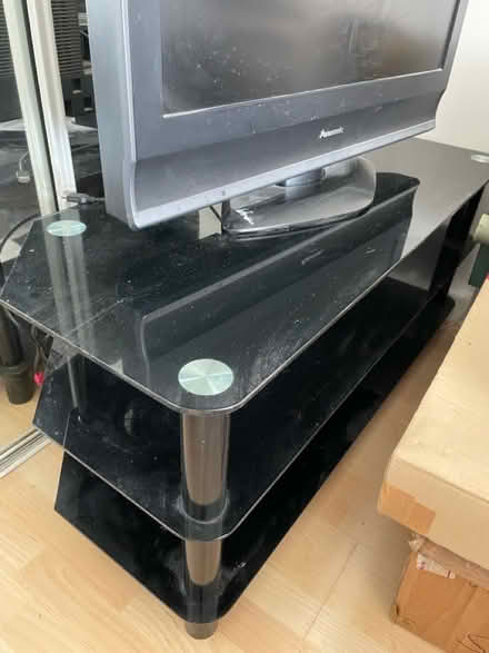Photo of free Black glass tv stand (Scale Hall, Lancaster LA1) #2