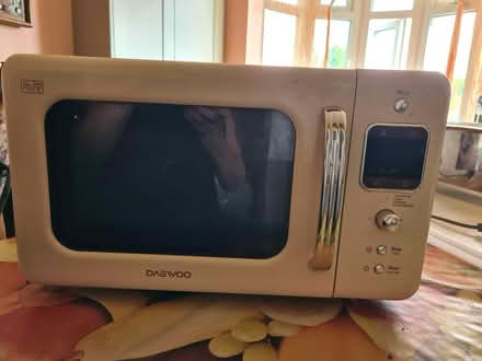 Photo of free Cream daewoo 800w microwave (BS5) #1