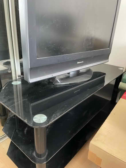 Photo of free Black glass tv stand (Scale Hall, Lancaster LA1) #1