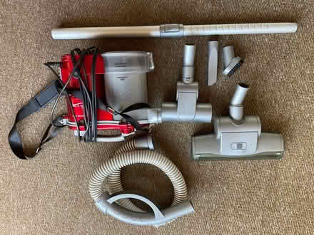 Photo of free Over shoulder loud Vacuum cleaner (Welling DA16) #1