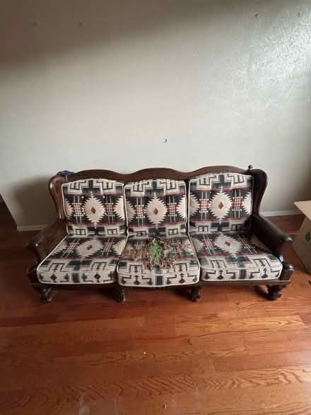 Photo of free Couch with a wood frame (Rio Rancho) #1