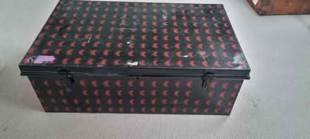Photo of free Black and red Metal trunk (East Dulwich SE22) #1