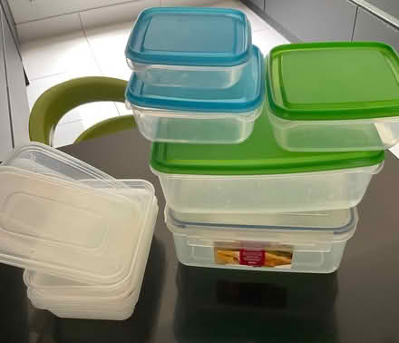 Photo of free A collection of plastic containers all with lids. (Woodford IG8) #1