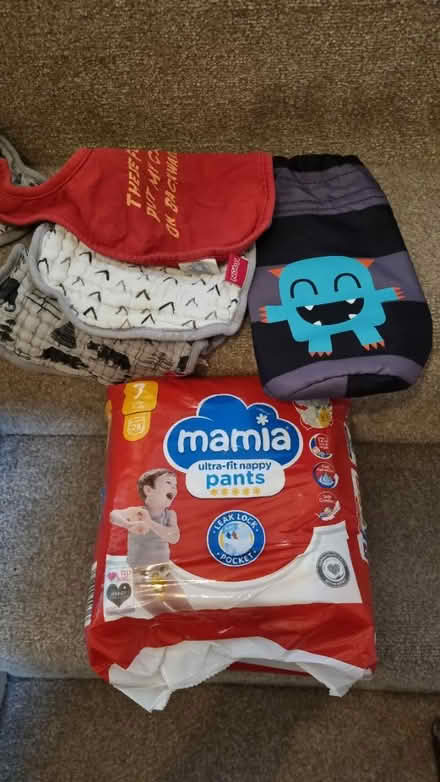 Photo of free Nappies and bibs (East Grinstead (RH19)) #1