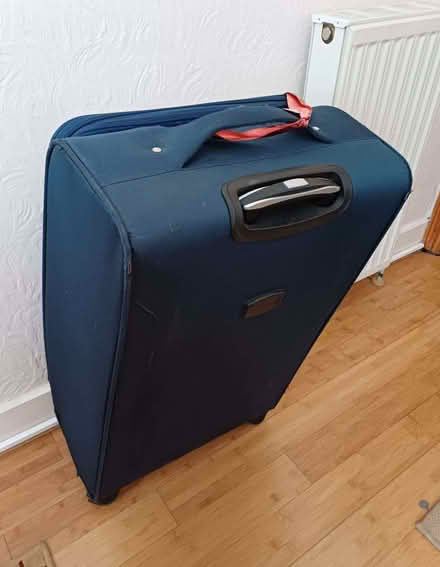 Photo of free Medium sized Blue Suitcase in Good Condition for Storage (Wanstead IG4) #2