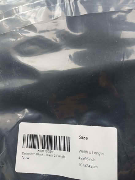 Photo of free Black blackout curtains still in packaging (Earlsfield SW18) #1