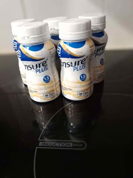 Photo of free 5 bottles of Ensure Plus - no longer needed. Pick up from (Selsley GL5) #1
