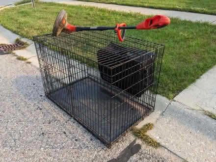 Photo of free Curb alert: Large dog crate (S of Ypsi) #1
