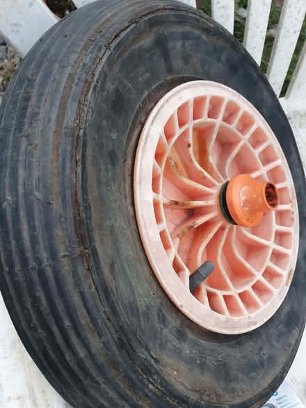 Photo of free Large wheelbarrow wheel (38cm/15" diam) fissured flat tyre (Wigmore HR6) #1