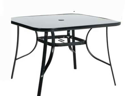 Photo of free Tempered grey glass outdoor family size table (Woodhouse S13) #1
