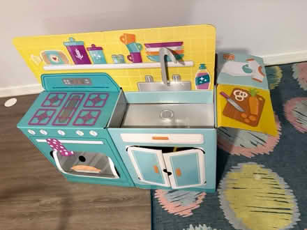 Photo of free Cardboard playhouse, coloring books (Woodfield Rd & Airpark) #2