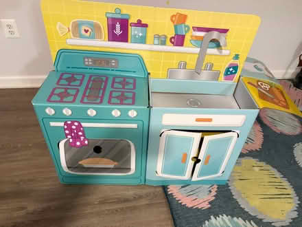 Photo of free Cardboard playhouse, coloring books (Woodfield Rd & Airpark) #1