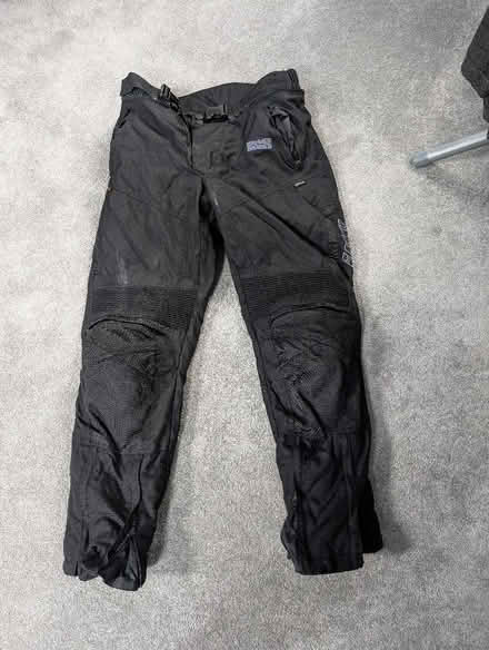 Photo of free IXS small/medium motorcycle trousers (West Byfleet GU22) #1