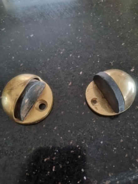 Photo of free 2 x shiny brass door stops (Wallingford) #1