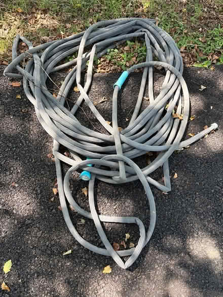 Photo of free 2 Hoses and a Hose Rack (Owings, Calvert County, MD) #1