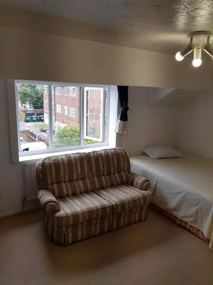 Photo of free 2 seater Sofa (mitcham) #1