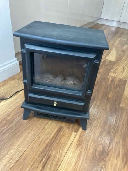 Photo of free Electric heater in log burner style (Wilmslow SK9) #1