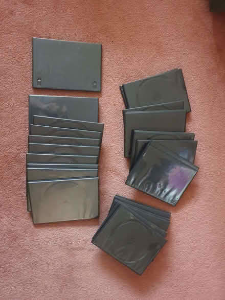 Photo of free 26 slimline DVD cases (The Rock TF3) #1
