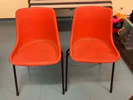 Photo of free 2 red plastic stacking chairs (Cheadle Hulme SK8) #1