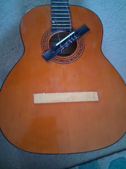Photo of free Classical guitar bridge detached (ME8) #1
