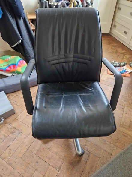 Photo of free Black leather swivel chair (Worcester WR2) #1