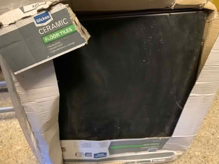 Photo of free 4 black tiles (Clapham MK41) #1