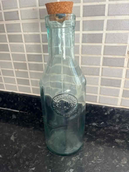 Photo of free 1 litre glass bottle (Woodchurch CH49) #1