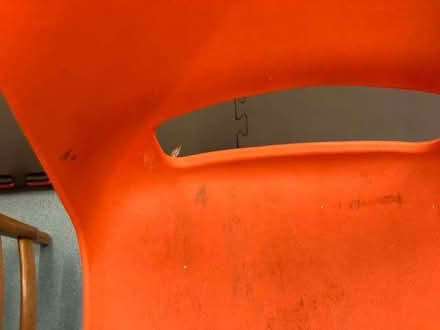 Photo of free 2 red plastic stacking chairs in a different design (Cheadle Hulme SK8) #2