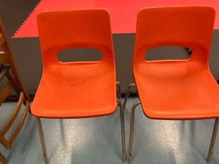 Photo of free 2 red plastic stacking chairs in a different design (Cheadle Hulme SK8) #1
