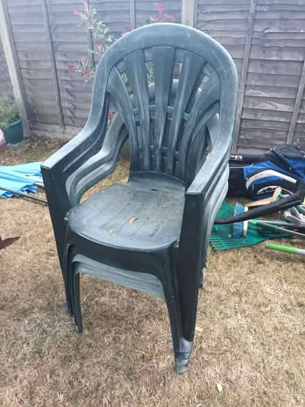 Photo of free 4 Plastic green garden chairs (Hemel Hempstead, HP1) #1