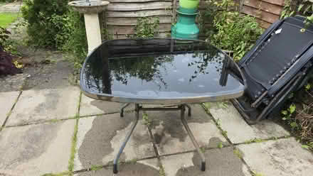 Photo of free Black Glass patio table (Cambuslang, Glasgow G72) #2