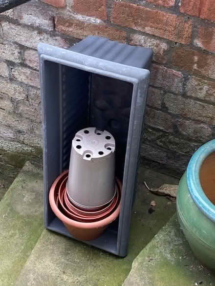 Photo of free Heavy 'ceramic' plant pot & various plastic ones (Malvern WR14) #2