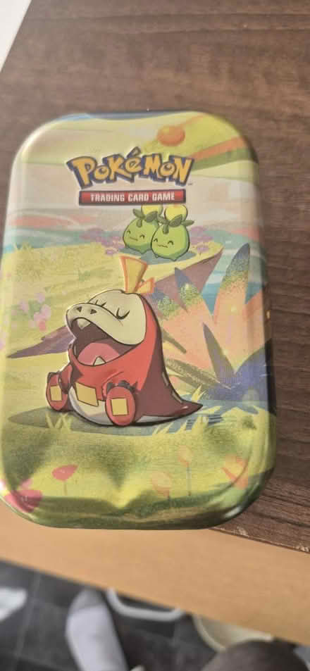 Photo of free Pokemon tin full with cards (Bracknell RG12) #1