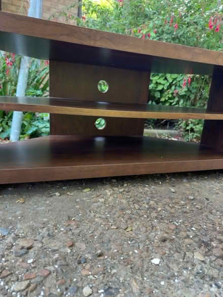 Photo of free Dark wood corner tv unit (Castle Point) #2