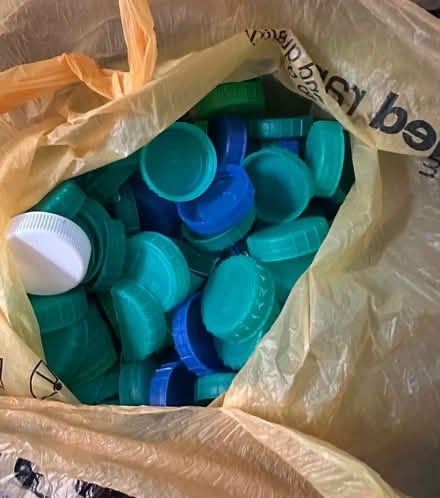 Photo of free Bag of green and blue milk bottle tops (Knaresborough HG5) #1