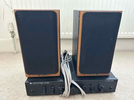 Photo of free Amp and two speakers (Tuckton. BH6) #1