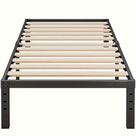 Photo of free Twin XL Bed Frame (Four Corners - Clermont) #2